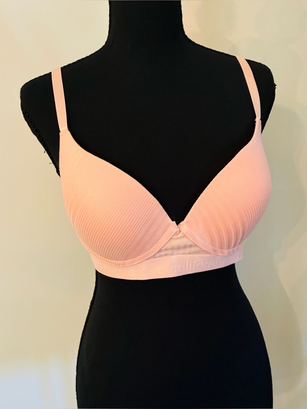 Two bras. Peach and white size 38D. Never worn.
